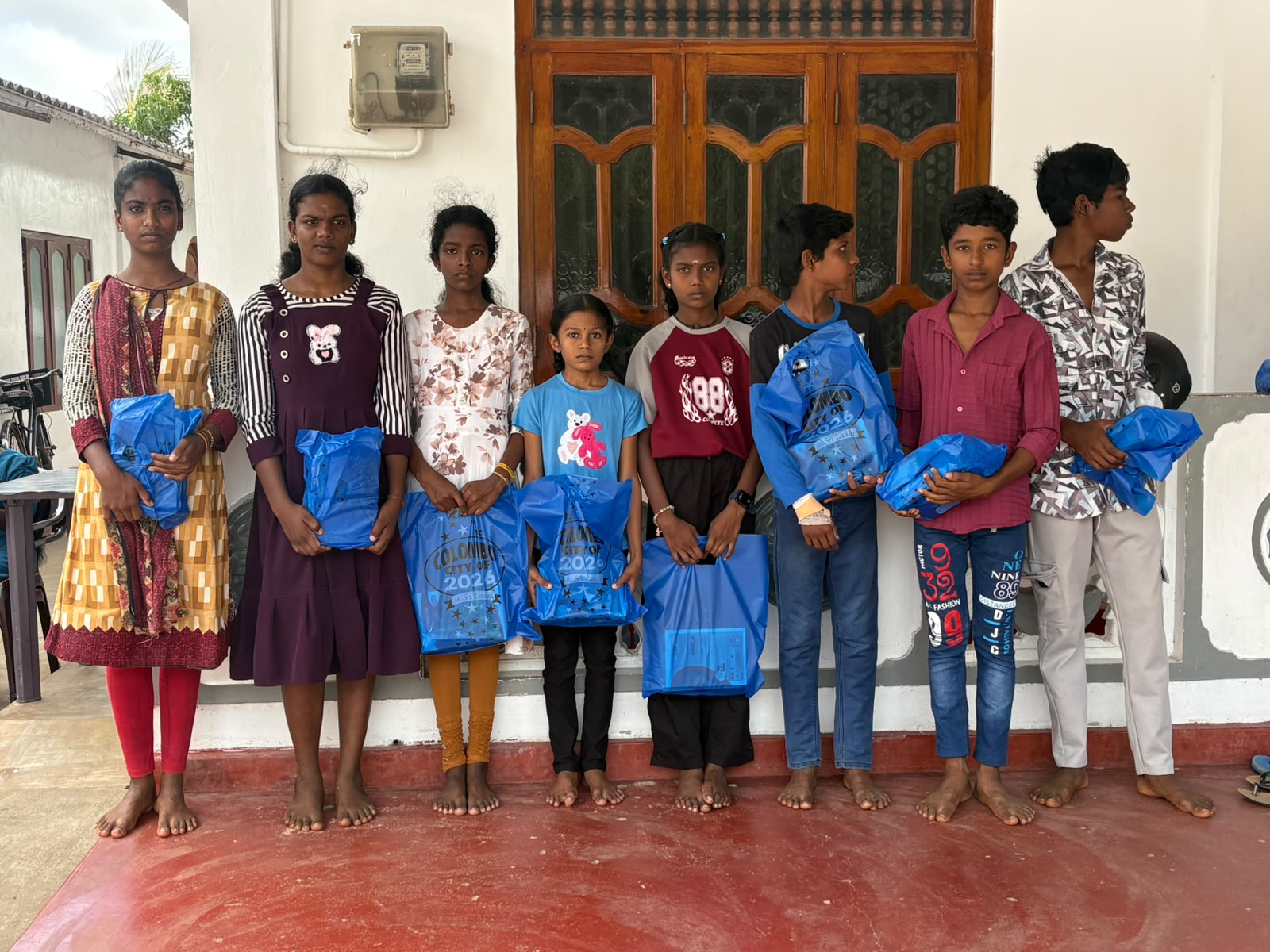 Students with the supply packs they received at our Vavuniya centre